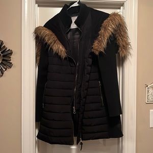 Gently used Calvin Klein Jacket. Black with hood. Womens L